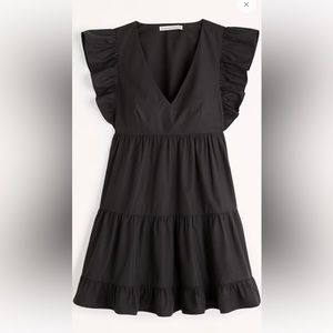 Abercrombie x Tia Booth

Flutter Sleeve Tiered Mini Dress size Small black